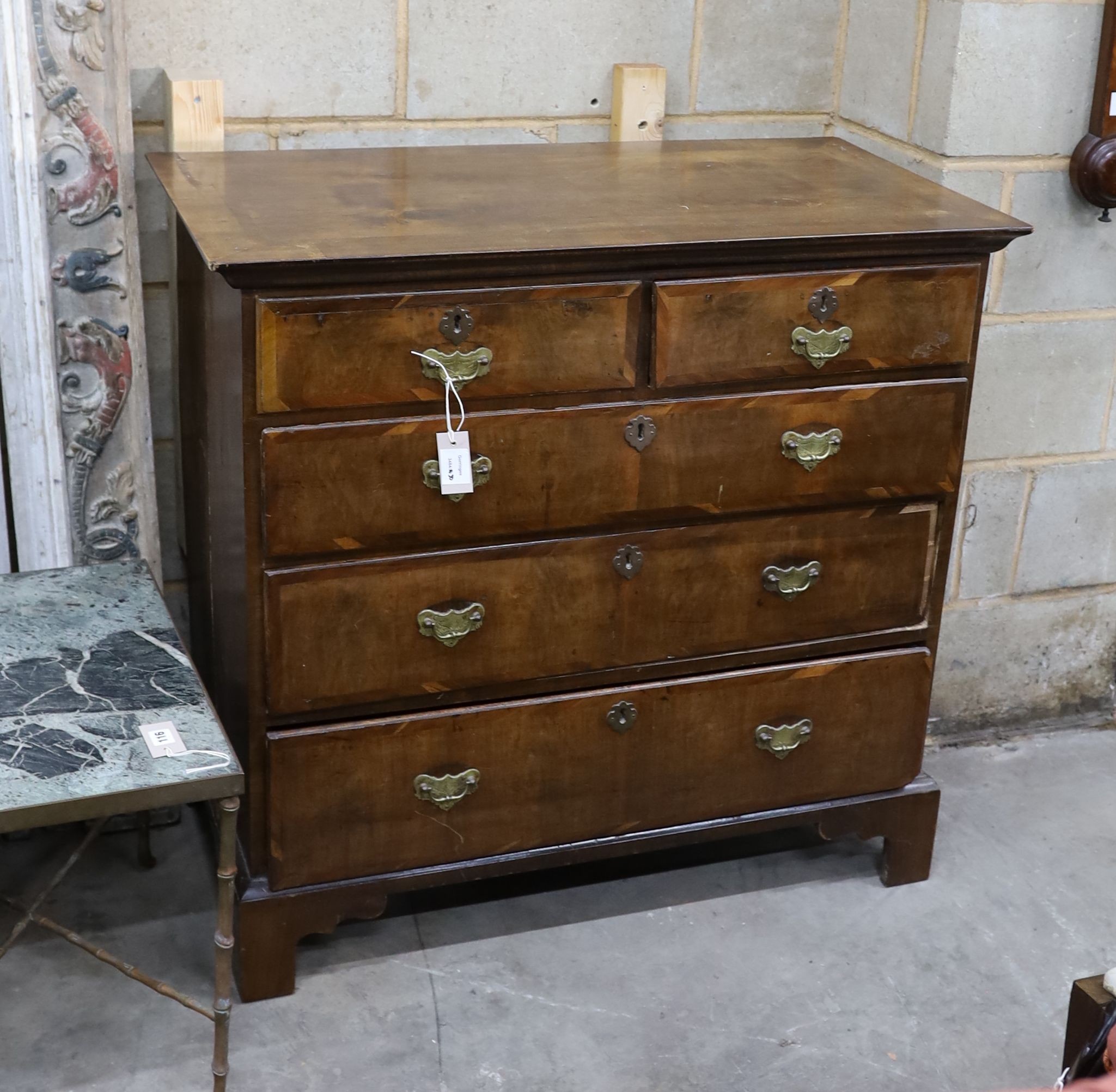 An 18th century and later banded walnut chest of drawers, width 99cm, depth 52cm, height 94cm